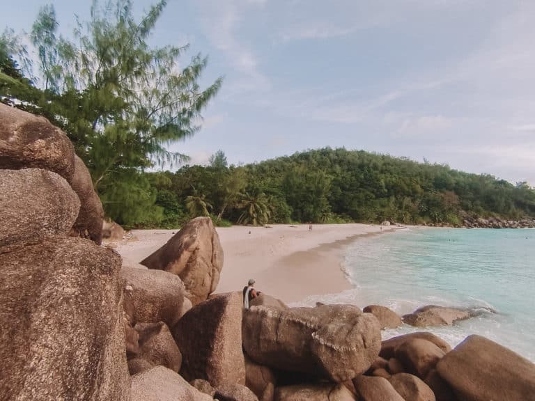 View of the beach from rocks in the Seychelles