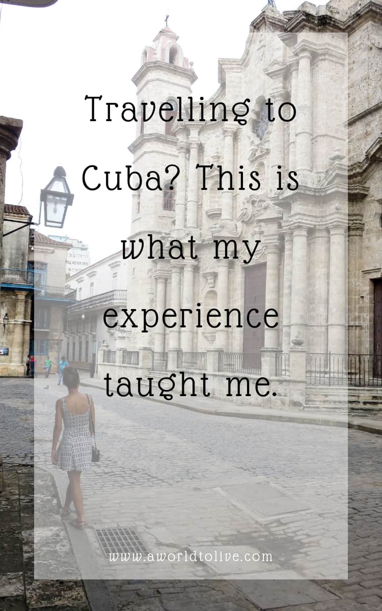 A large white stone church, with a lady looking at the building. Text over image saying; Traveling to Cuba? What you need to know before you visit