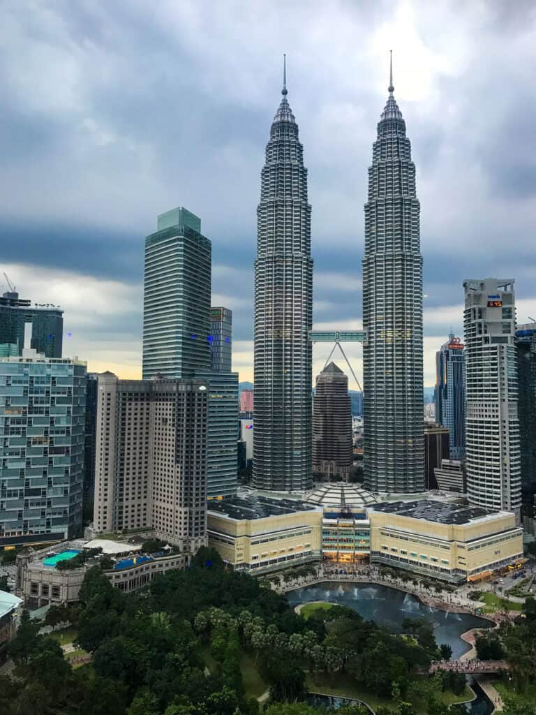 A view of the city skyline in Kuala Lumpur. In the center is the Petronas Twin Towers