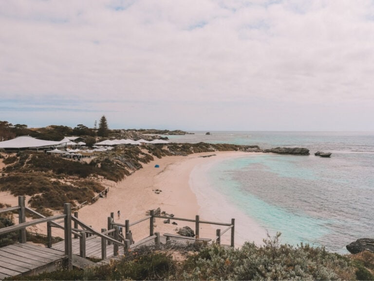 A view of Pinky's Beach on Rottnest Island in Western Australia. The water is clean but it's an overcast day