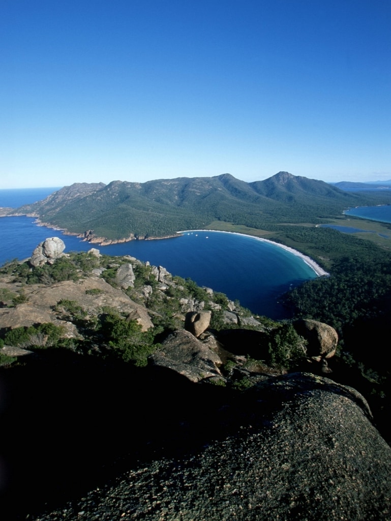 A view of wineglass bay in Tasmania, taken on a very sunny and clear day. Hiking here is a suggestion for your Australian bucket list