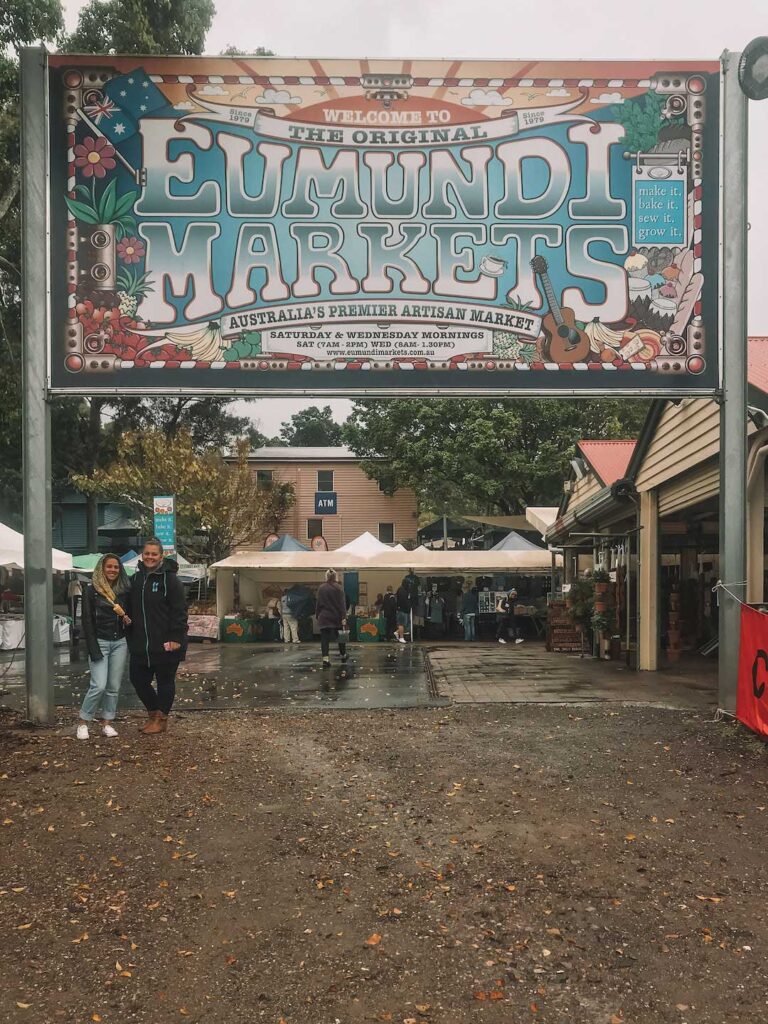 Standing at the front of the Eumundi Markets near Noosa in QLD