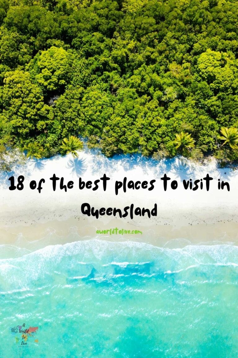 an aerial shot of a beach in Queensland. Text on image, 18 of the best places to visit in Queensland