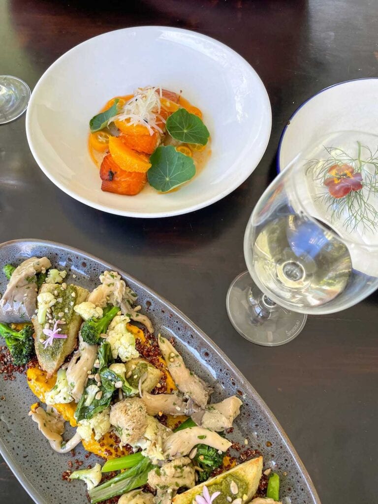 A birds eye view of two fresh meals on the table at Mavis Kitchen, in the tweed valley