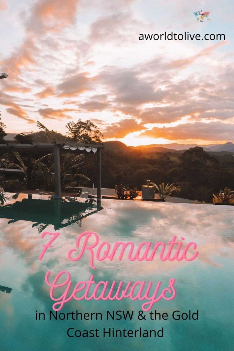 A swimming pool with the sun setting in the distance, the sun is creating the clouds to reflect pink and orange over the sky and pool. 7 romantic getaways Northern NSW & Gold Coast hinterland