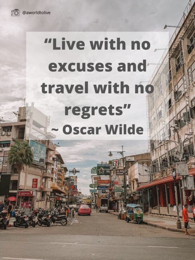 Khaosan Road in Bangkok, Thailand, on a quiet morning. Travel quote text overlay for article reasons you need to travel in 2022