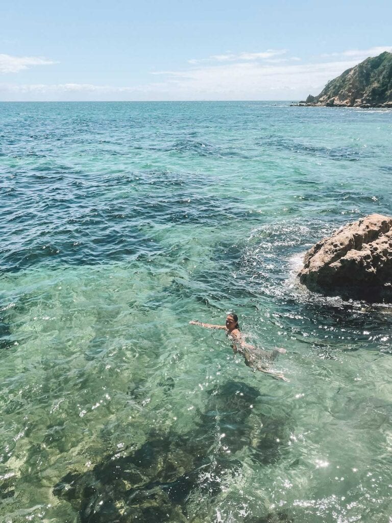 swimming in the clear blue waters along the Mornington Peninsula in summer