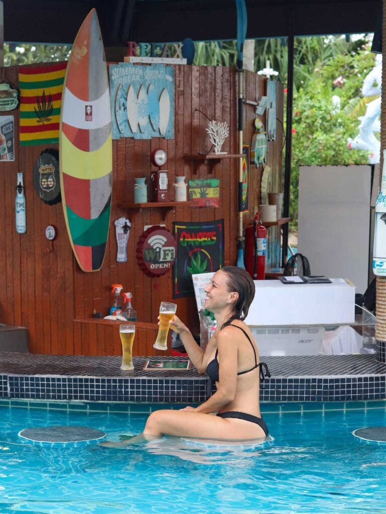 Enjoying a beer at the swim up bar at Karon's beachfront accommodation