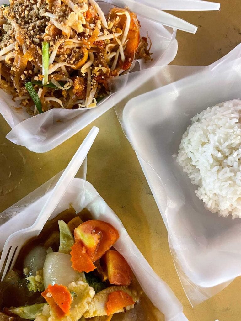three plates of Thai street food