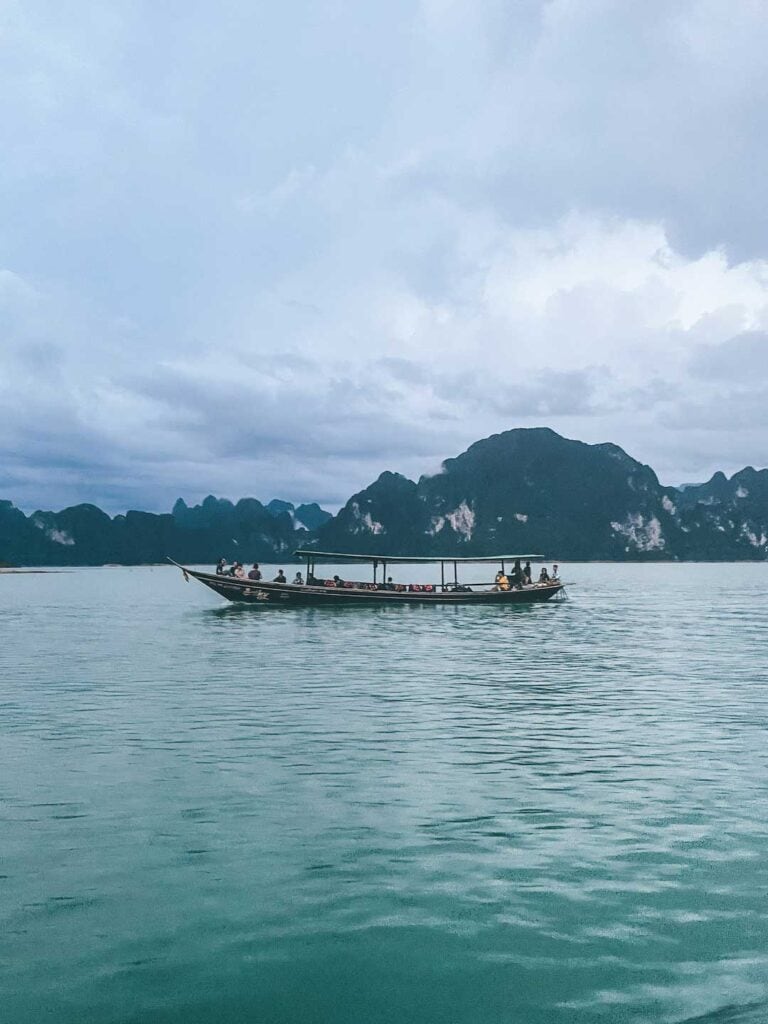 A wooded boat on Cheow Lan Lake, taken at the end of a jungle safari