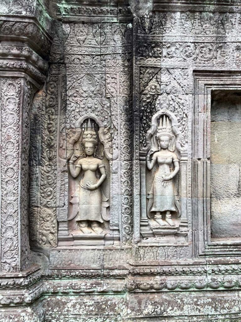 Statutes carved into the walls of Angkor Wat temples in Cambodia