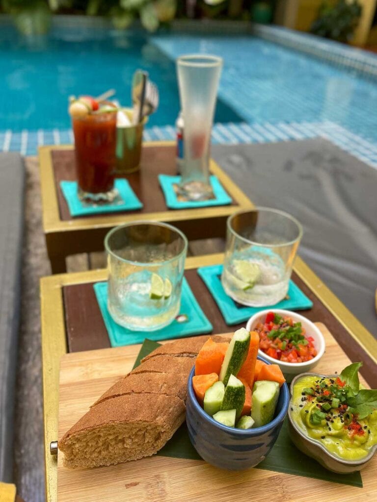 Drinks and entrees served by the pool at hotel old cinema