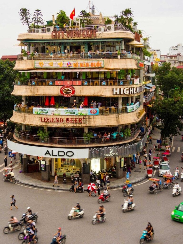 a famous 5 story building in Vietnams capital city, Hanoi. The building is very busy and is covered in Business signs. Hanoi is recommended in the guide This meal is recommended in guide things to know before traveling to Vietnam