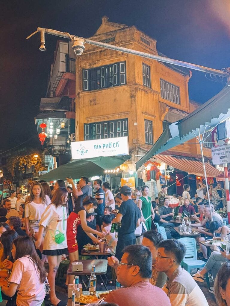 Beer street in Hanoi, during the night when the streets are filled with hundreds of locals and tourists enjoying a night out