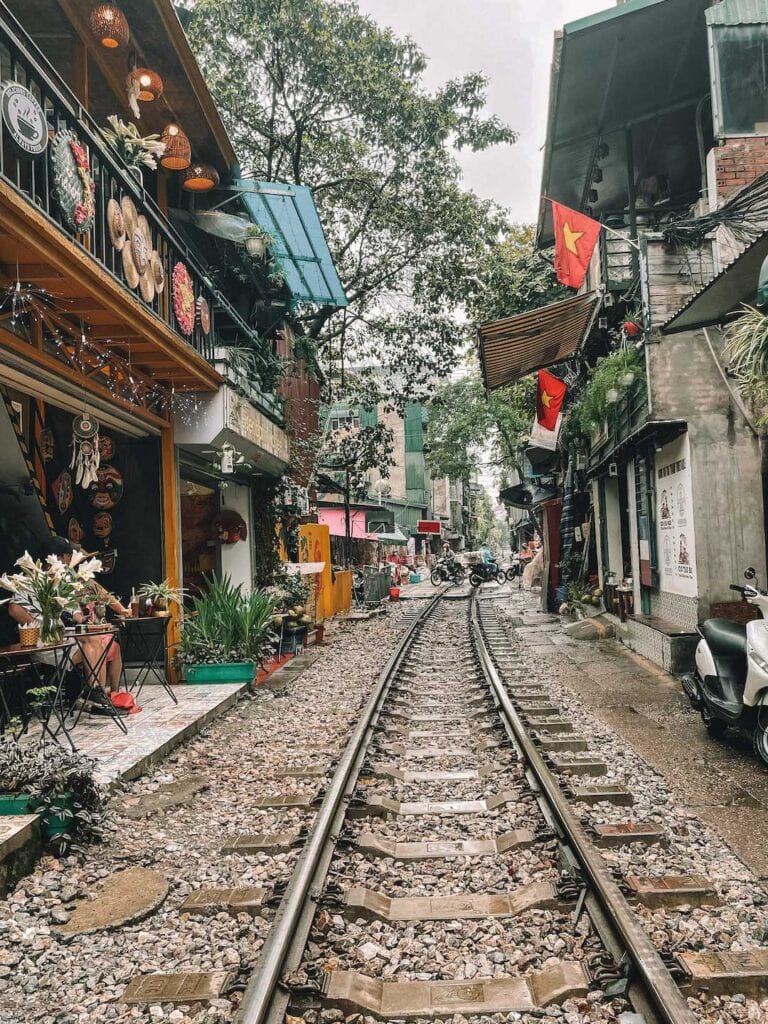 The empty train track in Hanoi, both sides of the track there are colorful and well decorated cafes. I recommend visiting train street on day one of north Vietnam itinerary