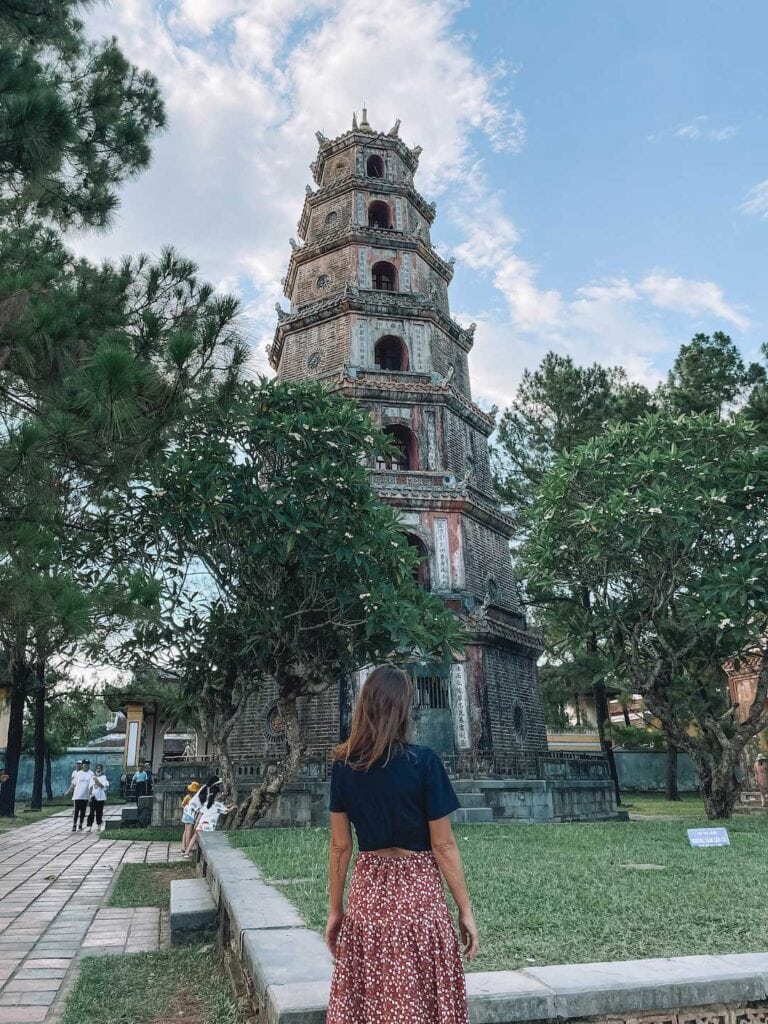 facing the Thien-Mu-Pagoda, on a sunny day in Hue. Central Vietnam