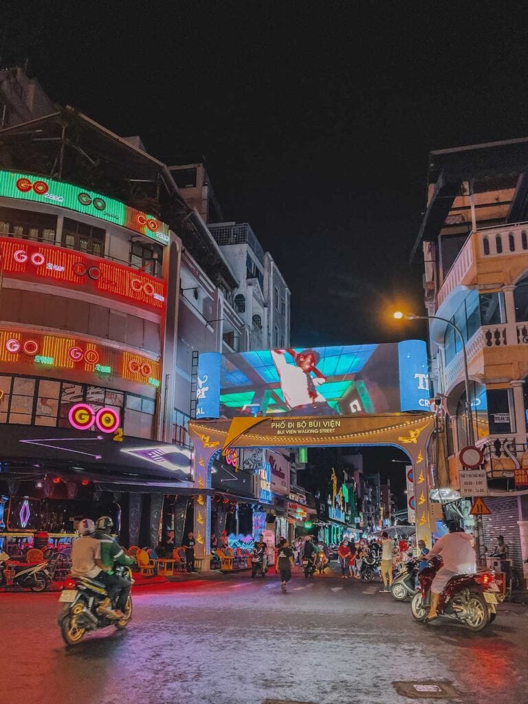 the beginning of bui vien walking street in Ho Chi Minh City. Taken at night showcasing the bright neon lights