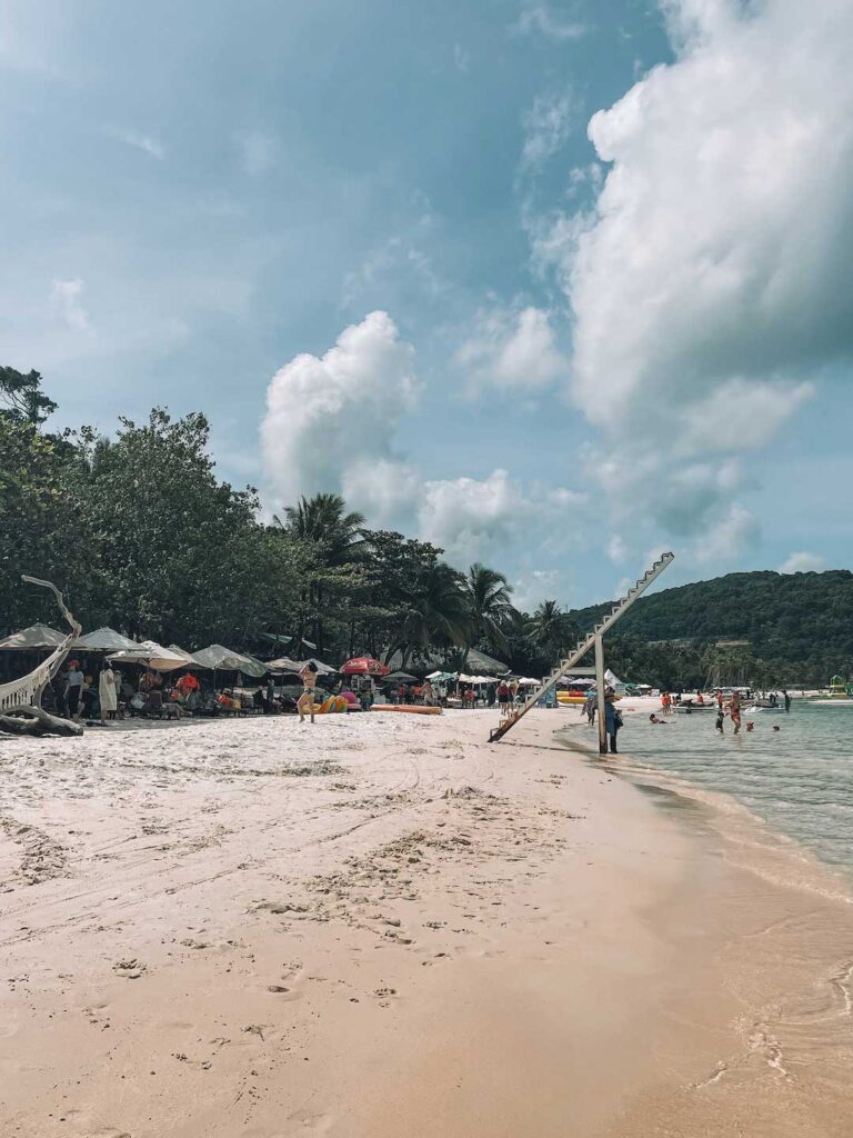 Hammocks, umbrellas and activities set up on sao beach vietnam