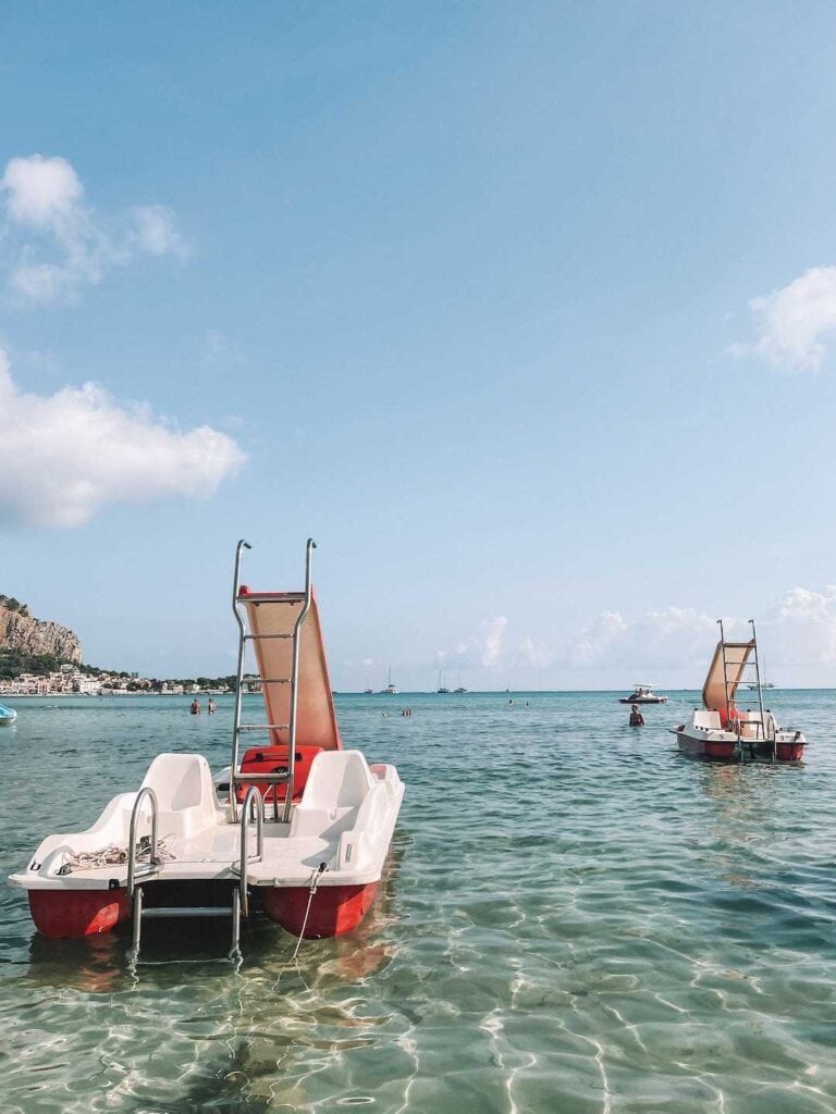 Paddle boats for hire on Mondello Beach in Sicily. And €15 for one hour. reason why palermo is worth visiting this summer