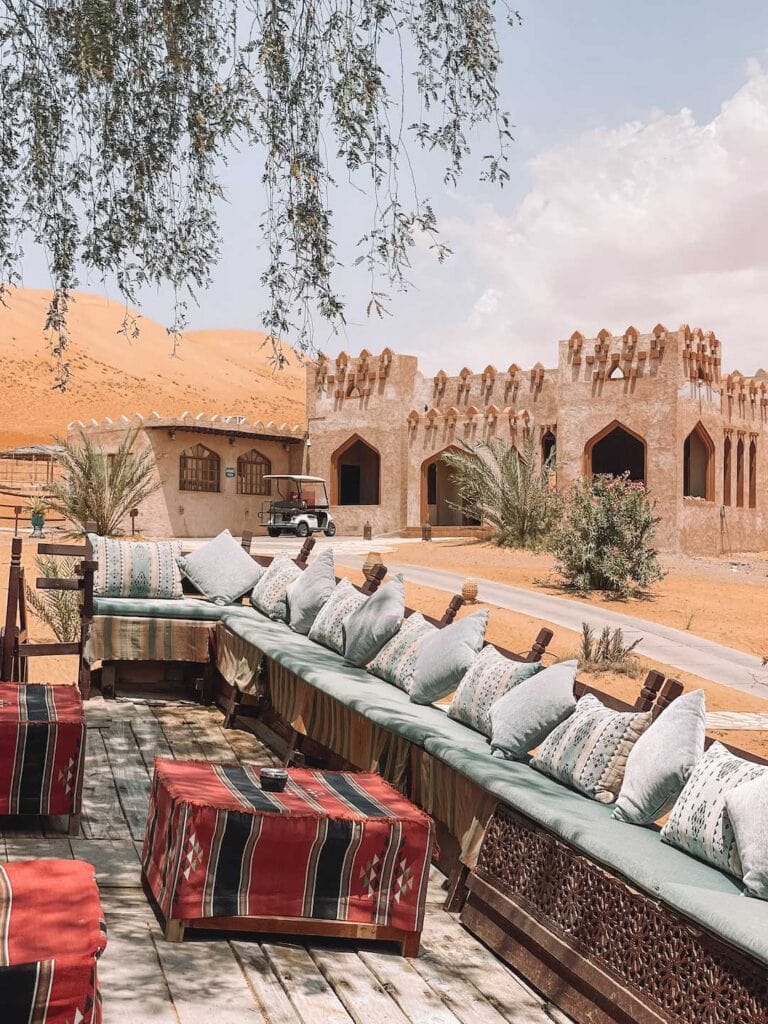 outdoor seating at a desert camp in Oman
