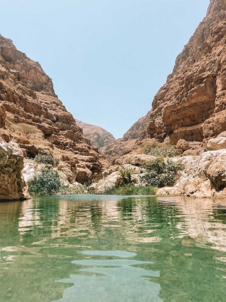 Emerald green water of wadi shab in Oman