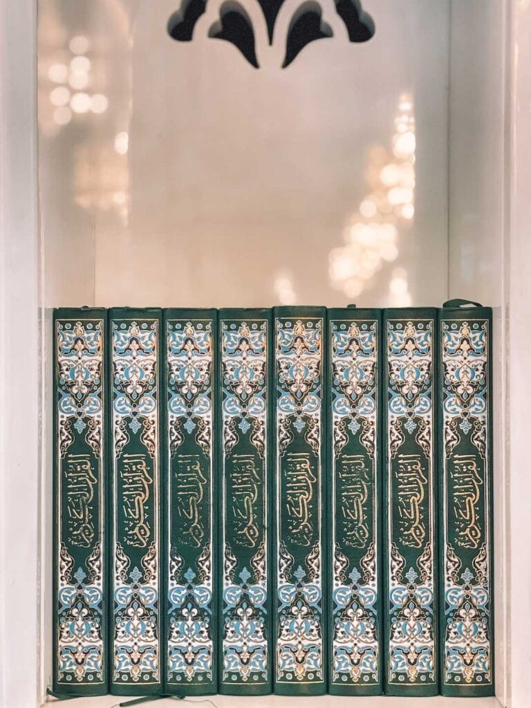 8 copies of the Quran displayed in the grand mosque in Muscat, Oman