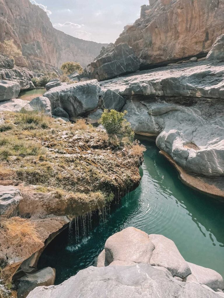 View of Wadi Damm. One of the swimming pools after a long hikes. Adventures in Oman