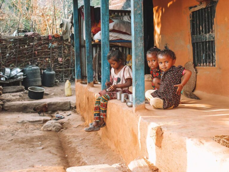 Young children outside the home in a remote village in Nepal