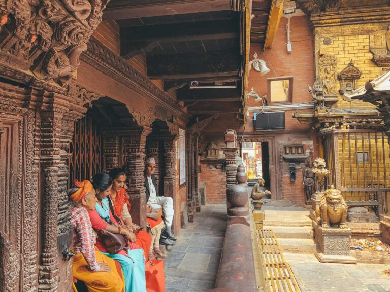 Locals dressed in colorful traditional clothing in Patan, Nepal