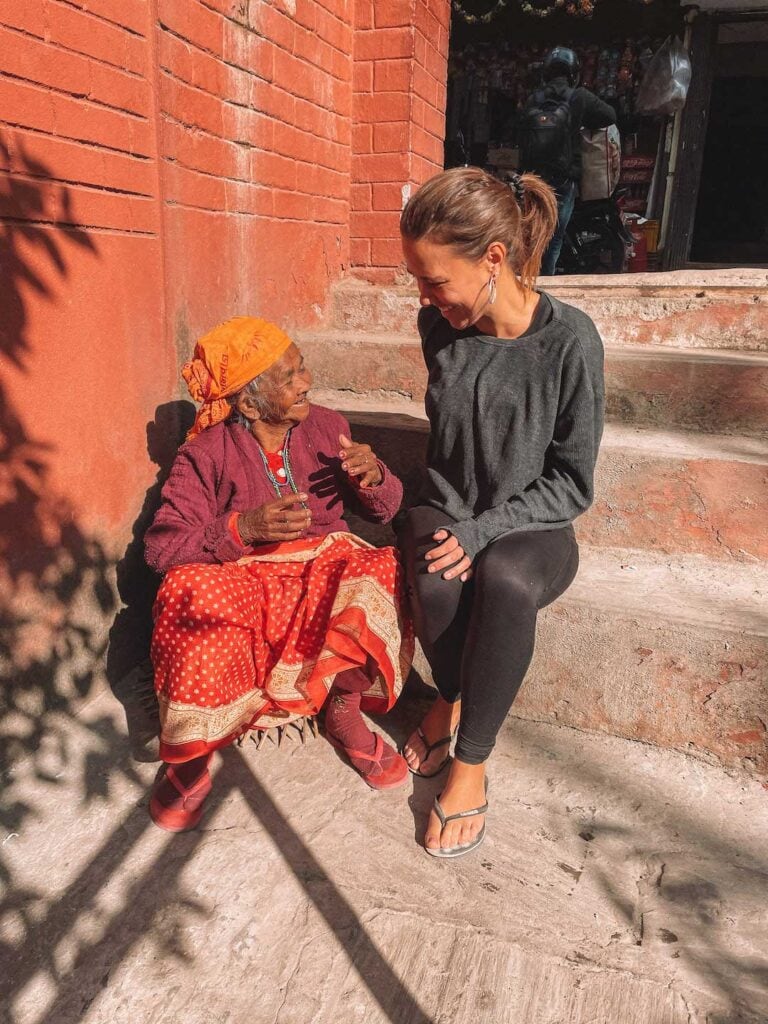 Elyse talking with elderly Nepalese women