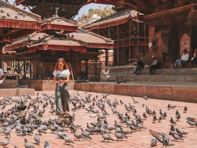 Feeding the pigeons in Kathmandu Durbar Square