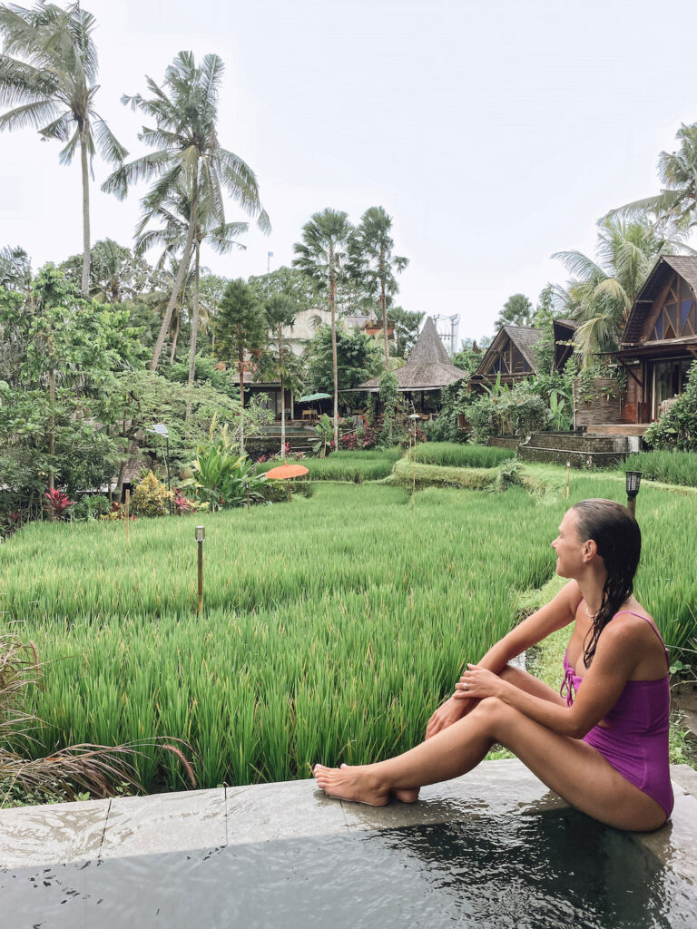 sitting on the edge of our private pool at Menzel Ubud