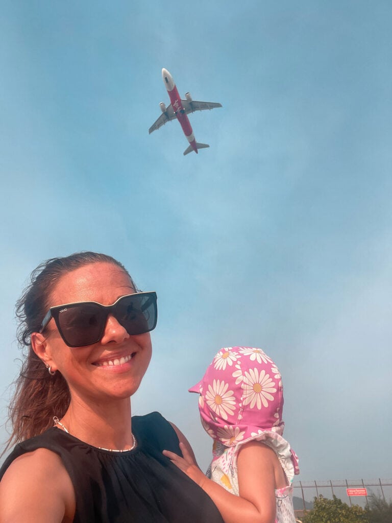 Air asia plane taking off over us at Mai Khao beach in Phuket