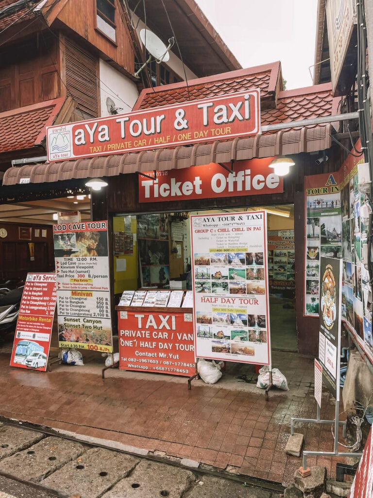 the ticket office for Aya tours in Pai. There is a lot of advertising out the front