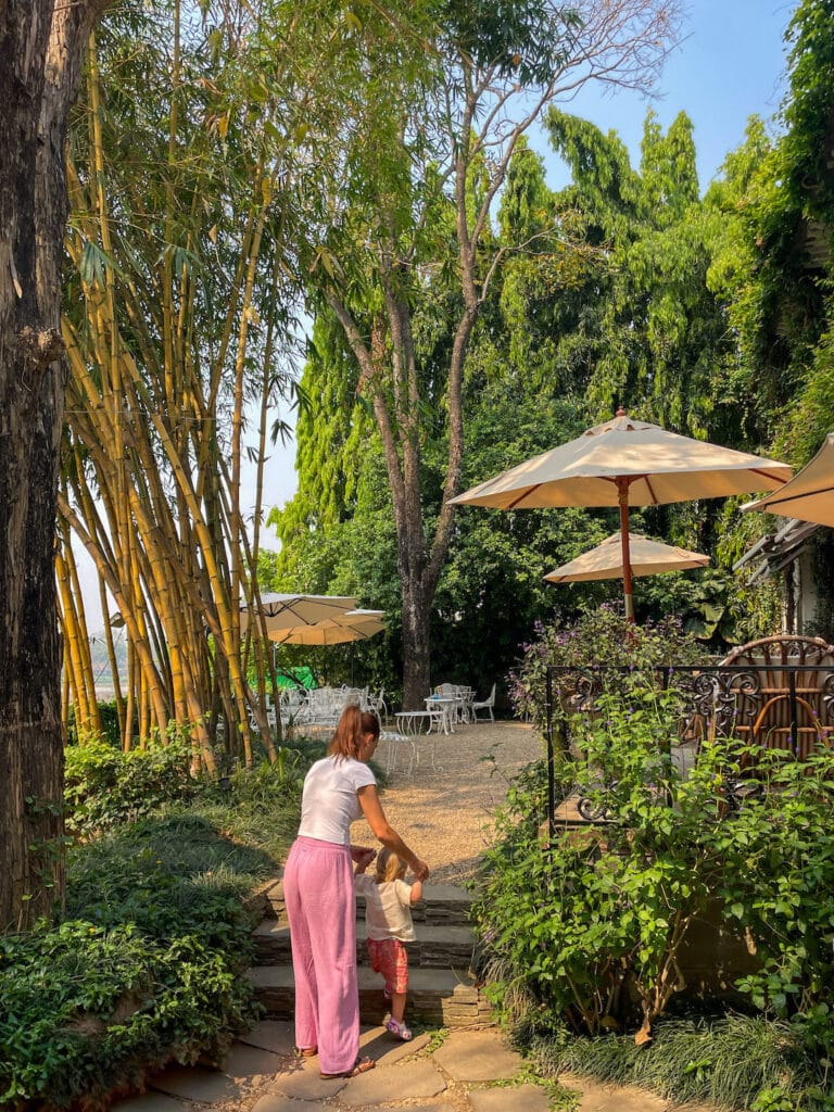 Walking into Chivit-Thamma-Da-Coffee-House in Chiang Rai. A riverside cafe near the blue temple