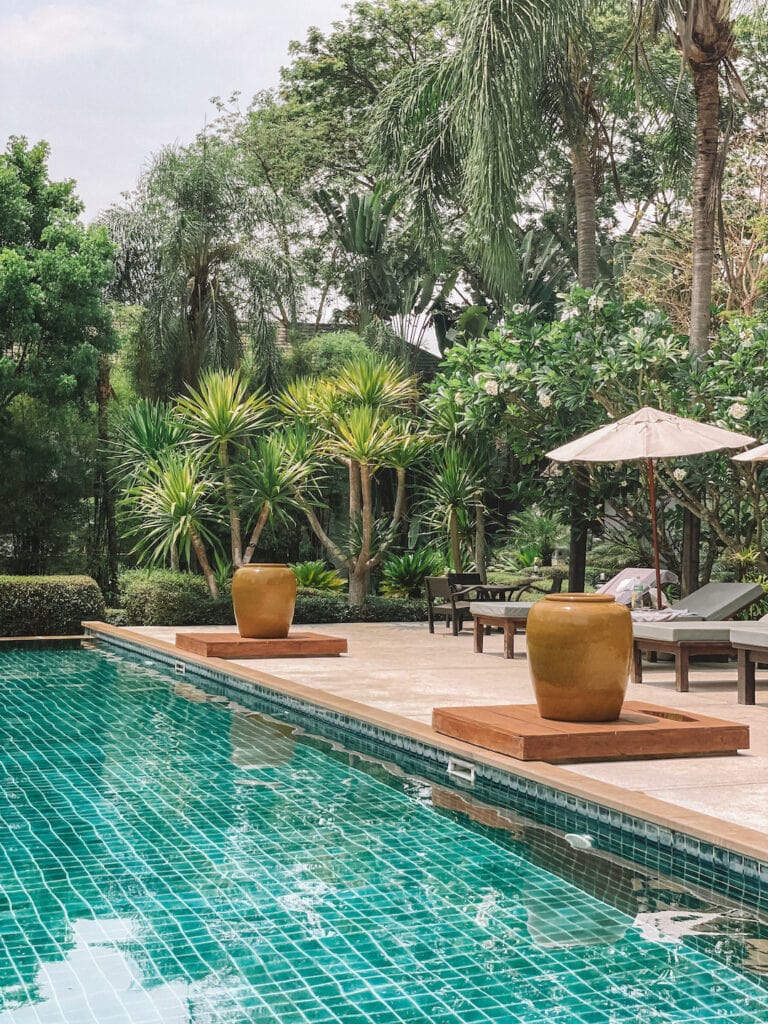 Pool and sunbeds at the Pai Quarter hotel in Northern Thailand