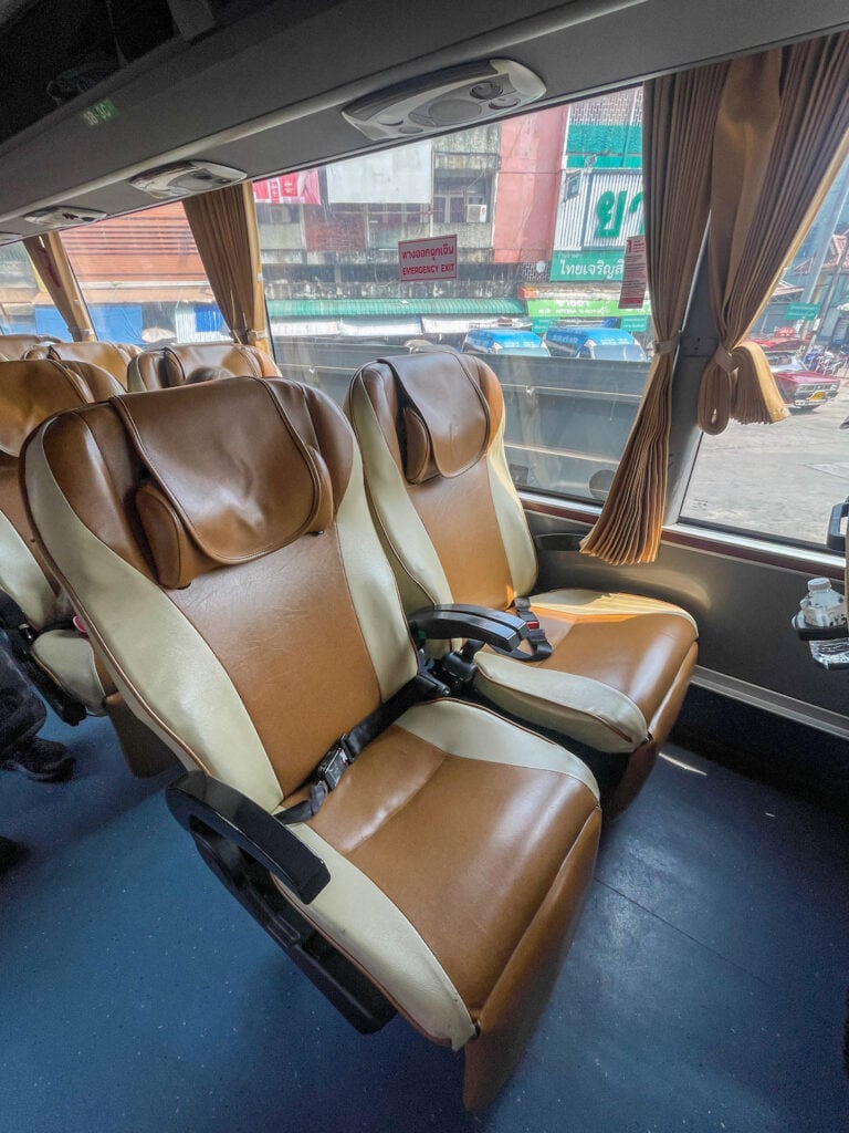 showing the seats of the VIP green bus in Northern Thailand