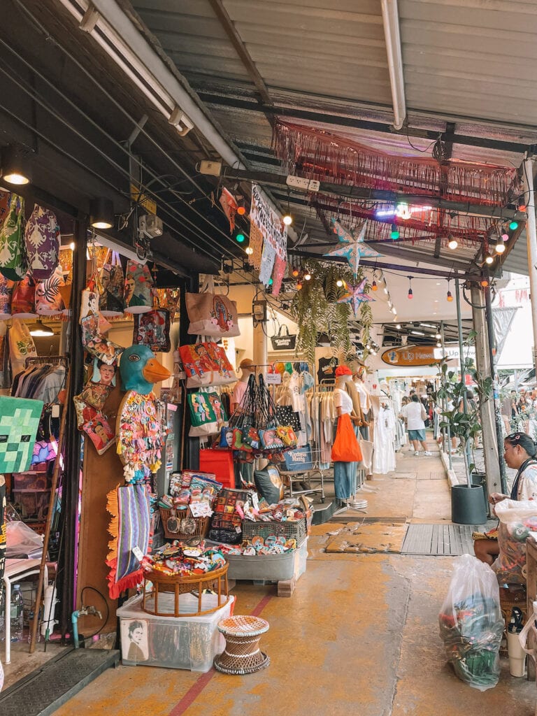 shops at Chatuchak market in Bangkok selling bags, clothes and accessories