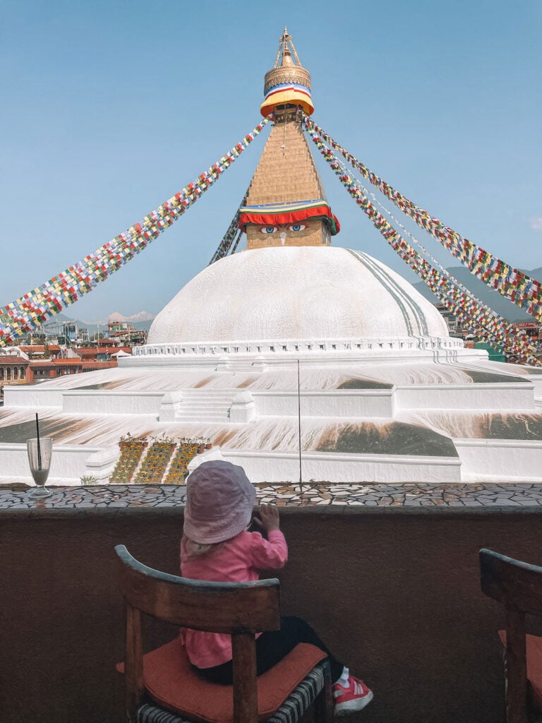 Sitting at Roadhouse Cafe with a view of Boudhanath Stupa