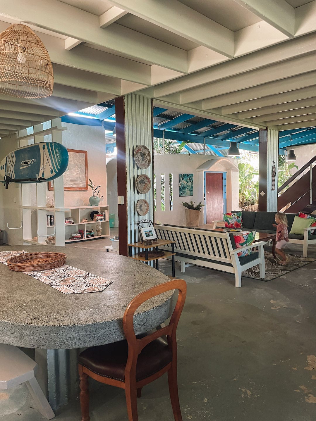 Bright, airy living room with tropical decor and natural light. Accommodation in Rarotonga